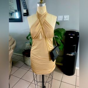 Brand new cross over halter dress tan never worn. Size medium